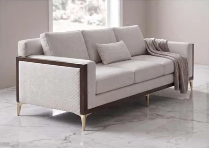 Modern sofa with a walnut frame and gold legs